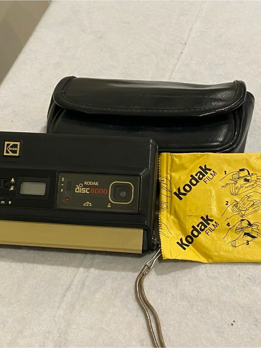 Kodak Disc 8000 Camera with Black Case and Yellow Film Pouch